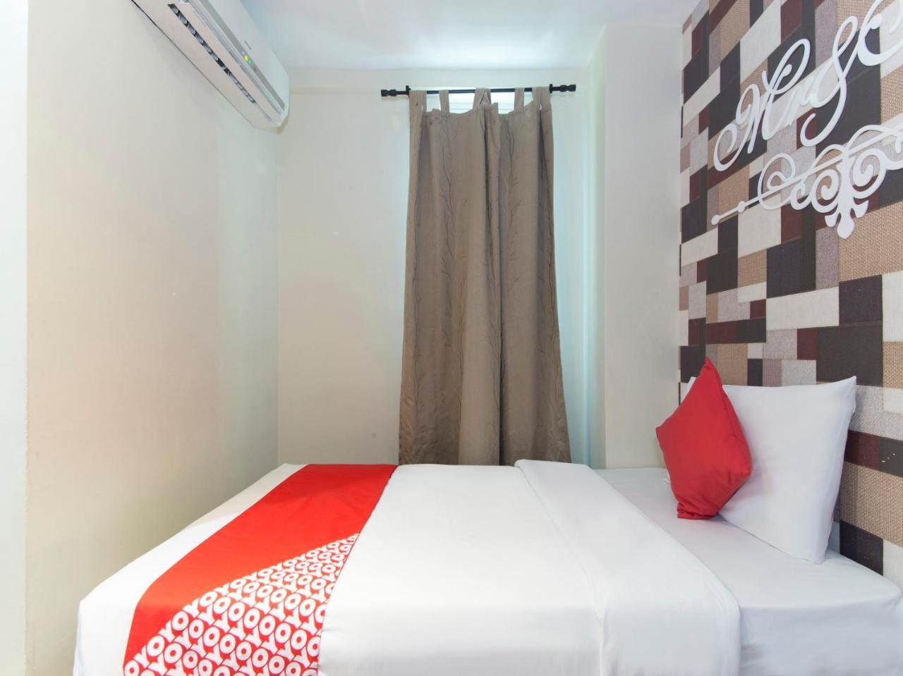 Oyo 604 Hotel Est Equine Park سيري كيمبانغان المظهر الخارجي الصورة